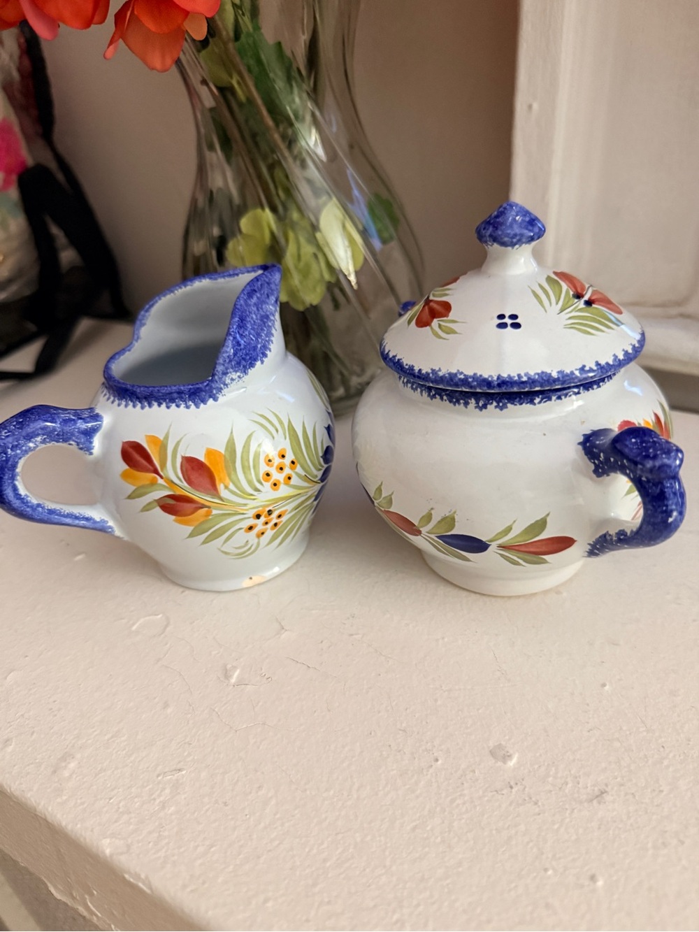 Vintage Henriot Quimper Fleuri Royal creamer pitcher and sugar bowl.